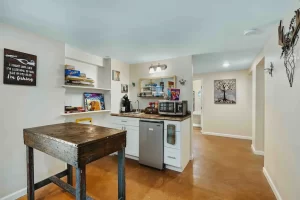 a mini kitchen in a vacation rental home